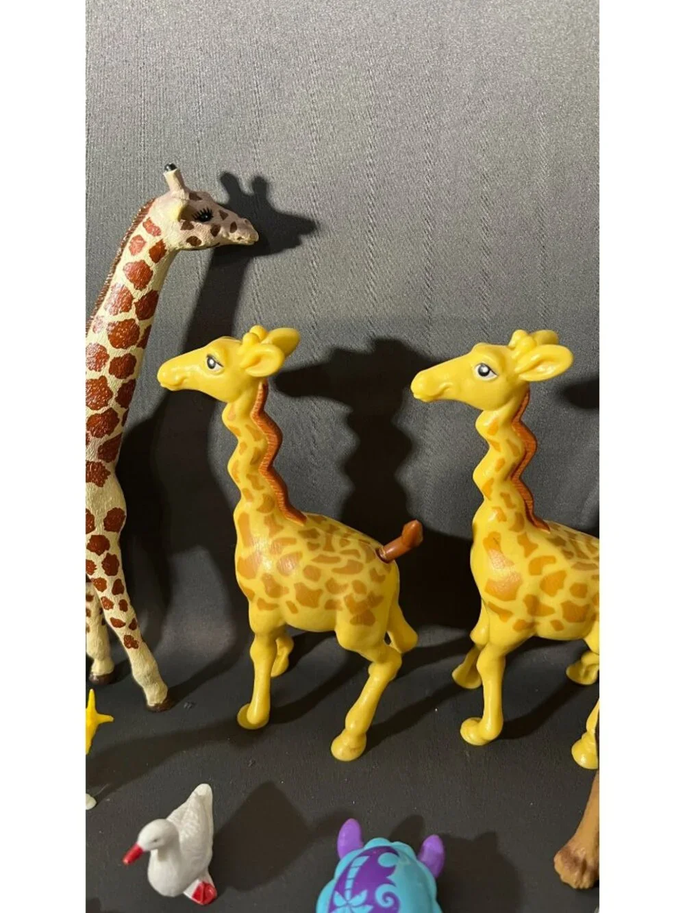 Assorted Animal Figurines Lot Includes Giraffes Lion Shark Goat Bee & More